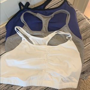 Sports bras. Set of three. Never worn. No tags
